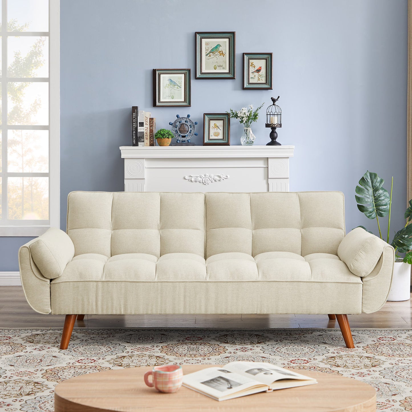 Stylish beige sofa with wooden legs, featuring tufted upholstery and a modern design for any living space