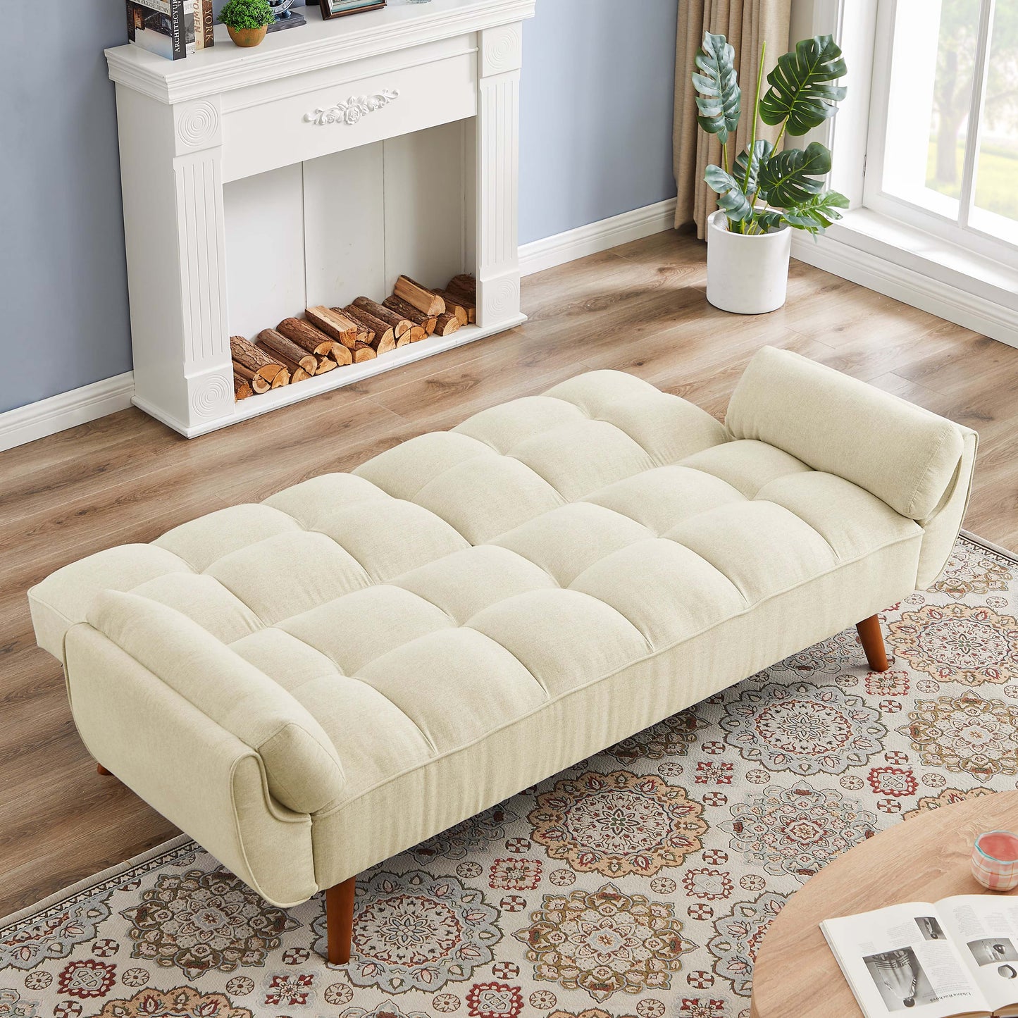 Hommeeys beige sofa with wooden legs featuring a tufted design and plush cushions in a cozy living room setting
